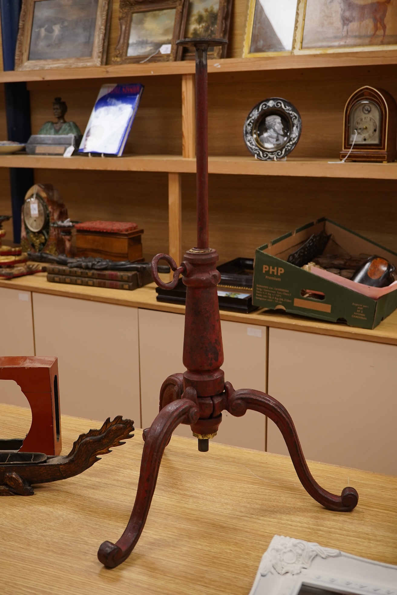 A 19th century red japanned (heavy) cast iron telescopic tripod base, 63cm minimum